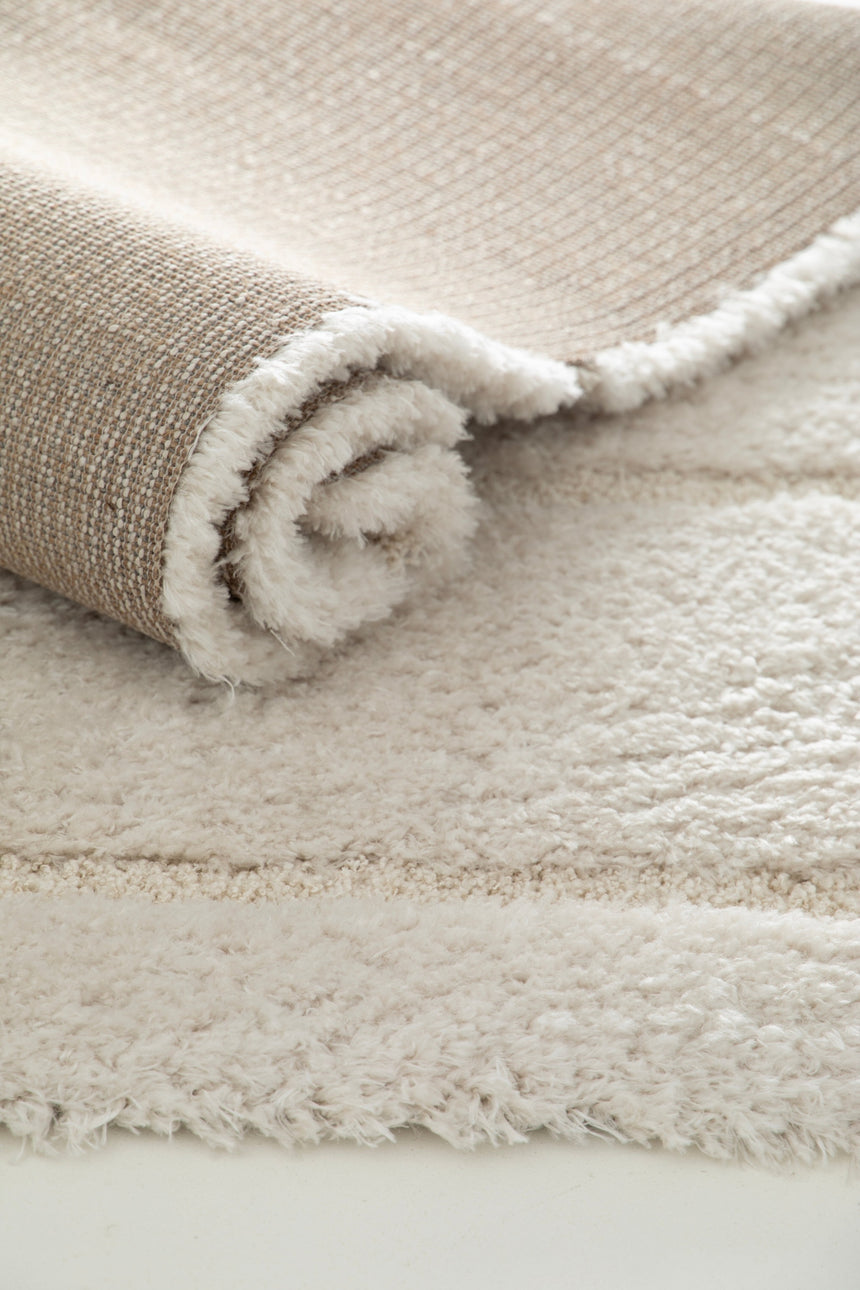 Soft and thick embossed rug in recycled polyester CALLIGRAMME