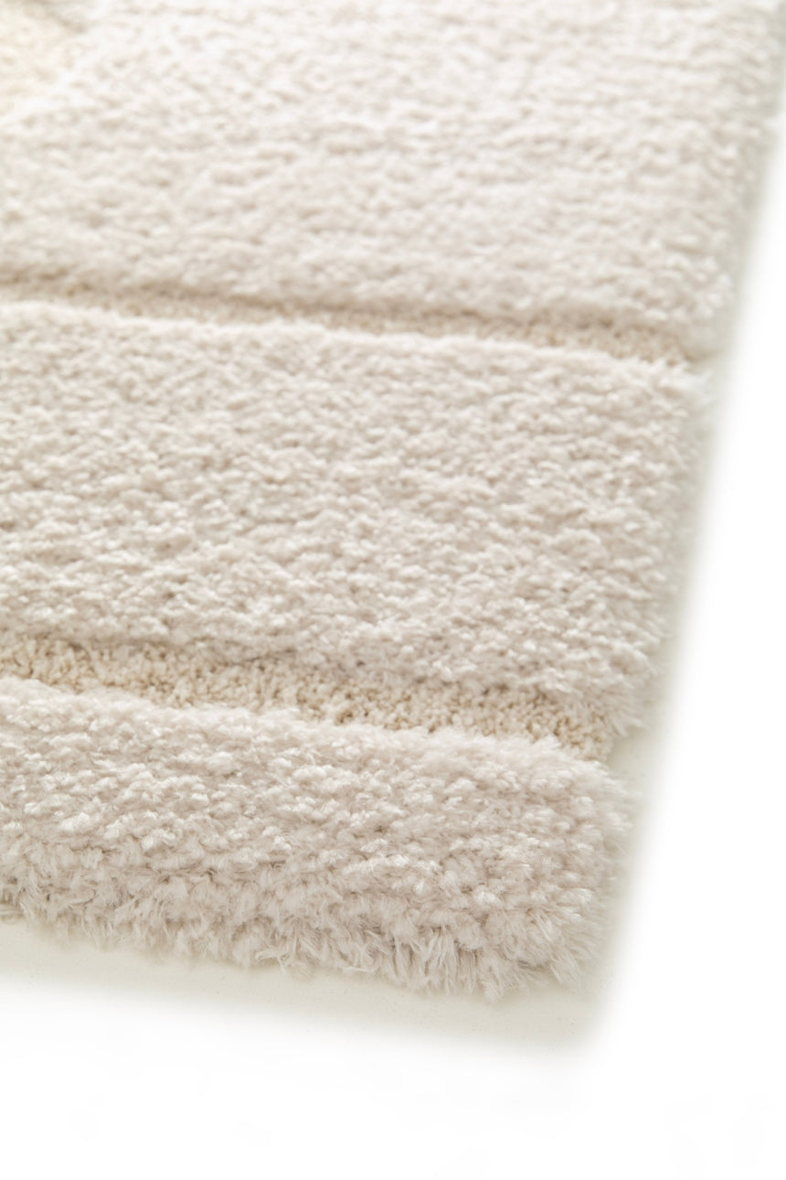 Soft and thick embossed rug in recycled polyester CALLIGRAMME