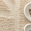 Soft, thick, embossed rug in recycled polyester MURMURE