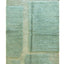 Graphic Berber rug with raised wool weaving