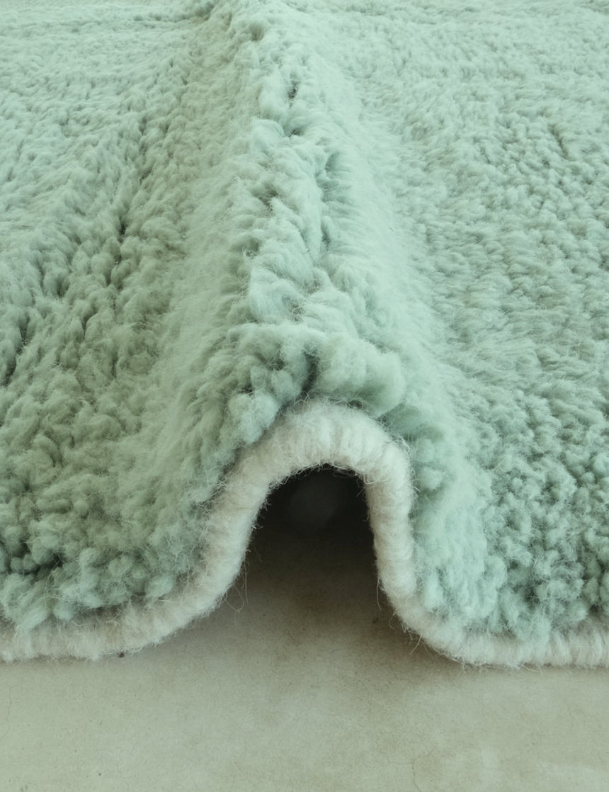 Graphic Berber rug with raised wool weaving