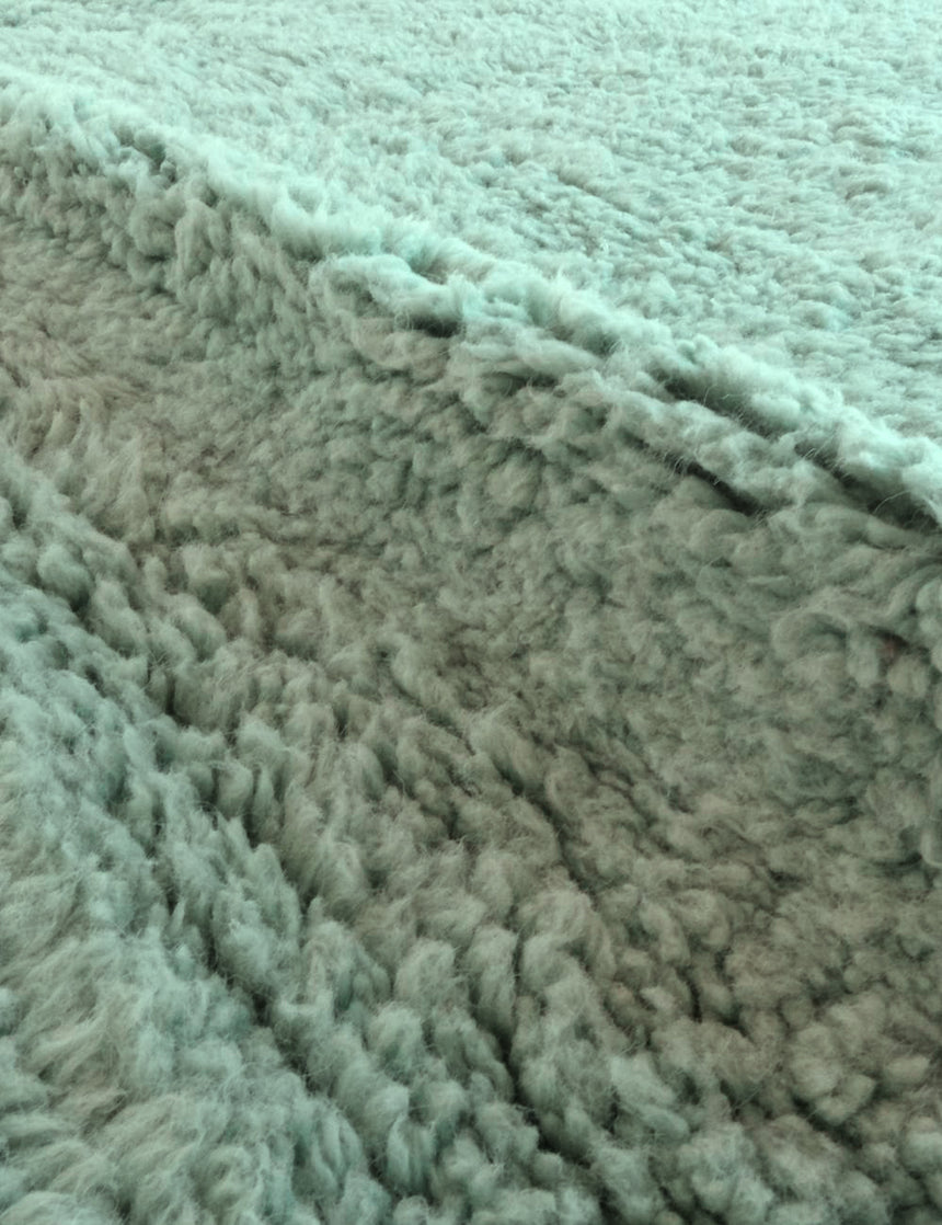 Graphic Berber rug with raised wool weaving