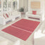 Tapis en fibres recyclées tissé à la main LEONOR