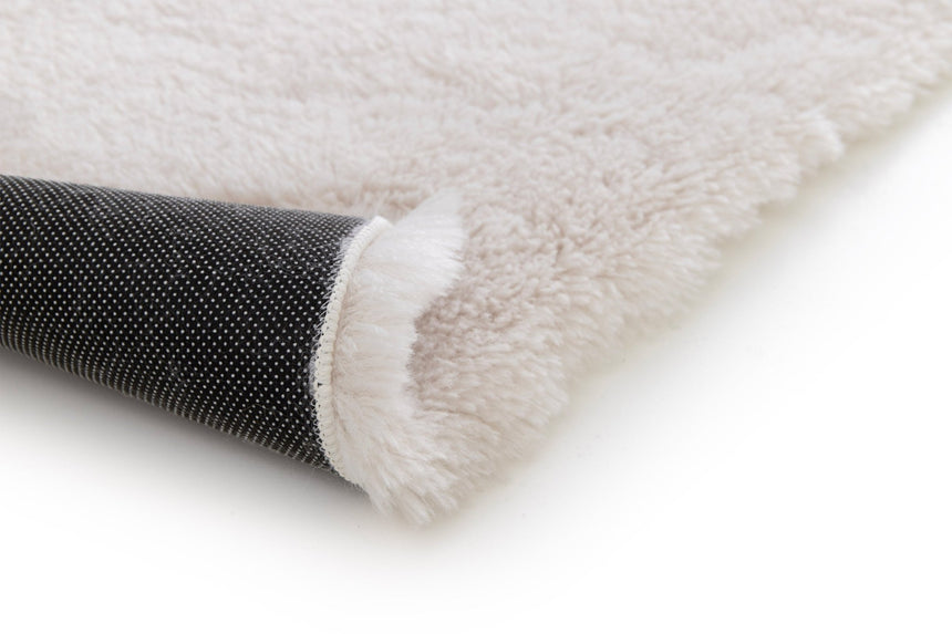 Tapis shaggy ultra - doux effet laine forme galet NUKKA - AFKliving