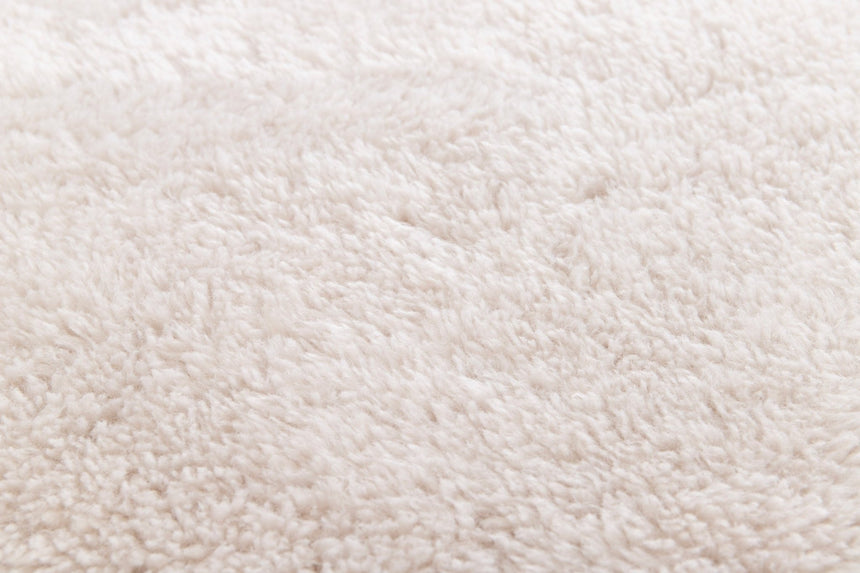 Tapis shaggy ultra - doux effet laine forme galet NUKKA - AFKliving